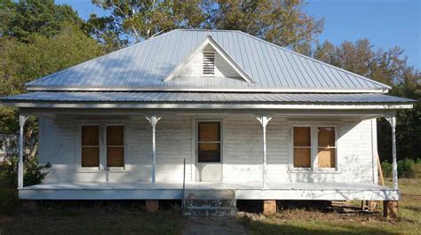 white house gray metal roof|white house with galvalume roof.